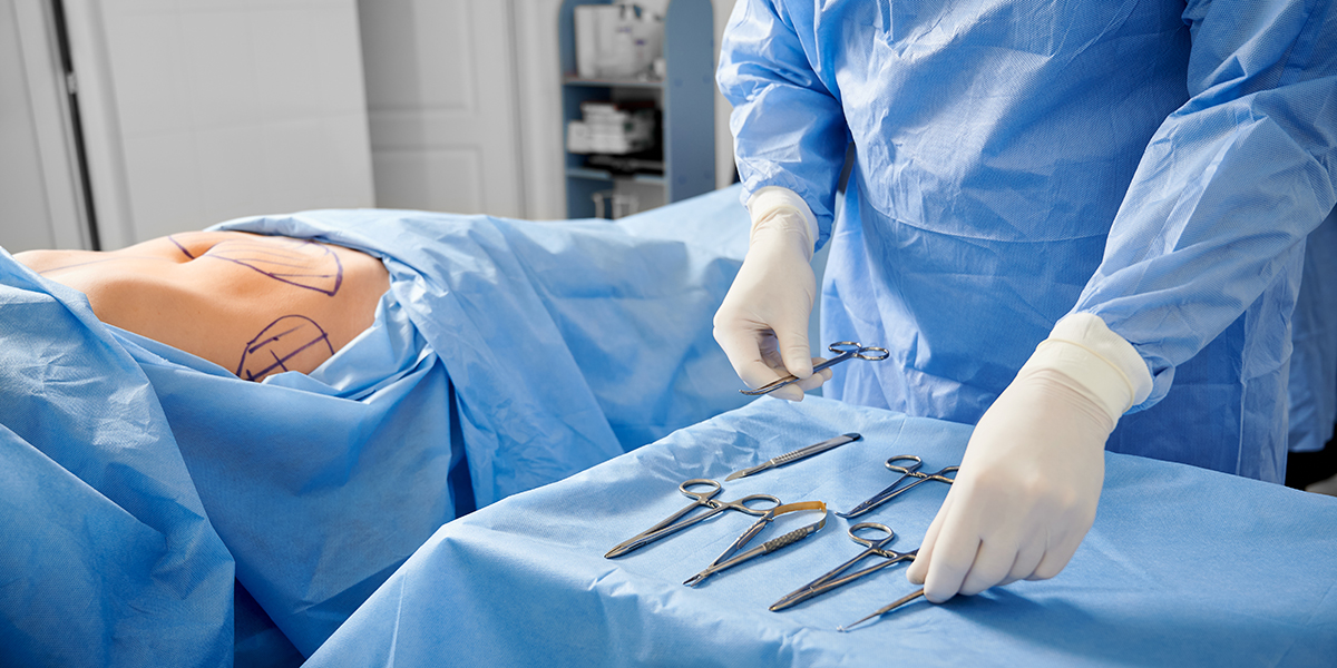Surgeon,In,Sterile,Gloves,Getting,Ready,Medical,Instruments.,Patient,With