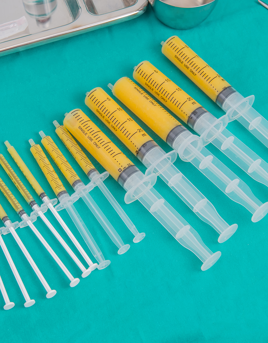 Syringes,Of,Fat,For,Fat,Grafing,On,Steriled,Green,Fabric